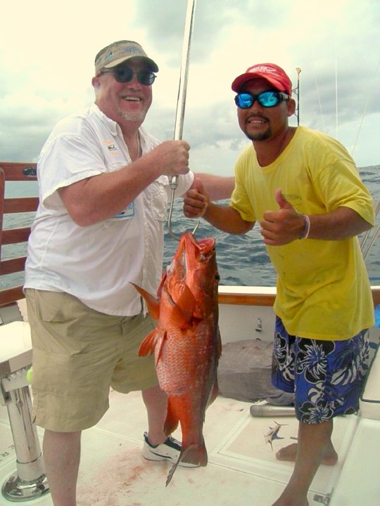 My Friend Robert  (he likes to see his picture) With First Mate Carlos and a nice Snapper!