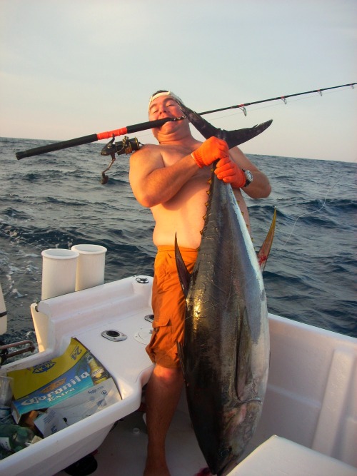 Yellowfin Tuna 200lbs on PoliconFondido panga, pole in mouth caught this fish, Capt Darin