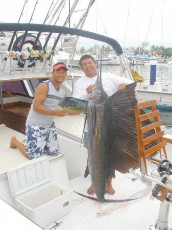 Sailfish Everywhwere, Magnifico with First  Mate Charlie and Capt. Cesar