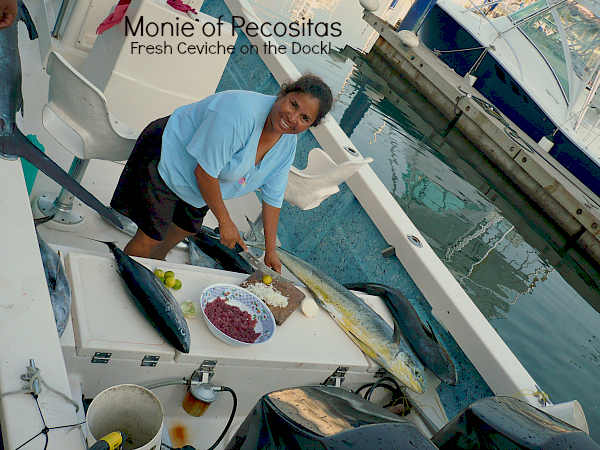 Capt. Mony making Ceveché on the dock. Your job, get cold beer, hot sauce and Tostadas. . . . she´ll do the rest amigo !! And don´t forget the tip.....