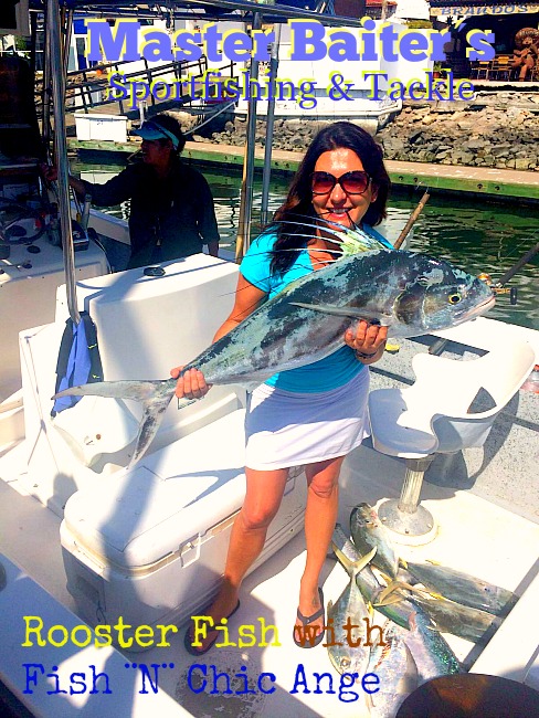 Our Store Mgr Ange (Fish ¨N¨ Chic) holding a 35 lb Rooster fish boated off Sayulita